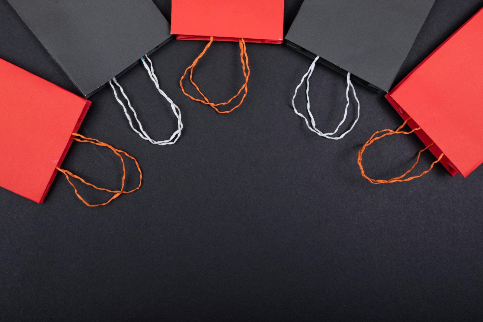 Red and black shopping bags representing online retail and e-commerce
